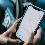 A Person Checking the GPS on the Cellphone