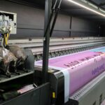 a large machine with a lot of papers on it
